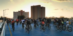 Team up with folks who love spokes at the monthly bike bash, Critical Mass. (Photo: Esteban Hernandez)