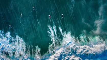 Aerial view of surfers in Bali.
