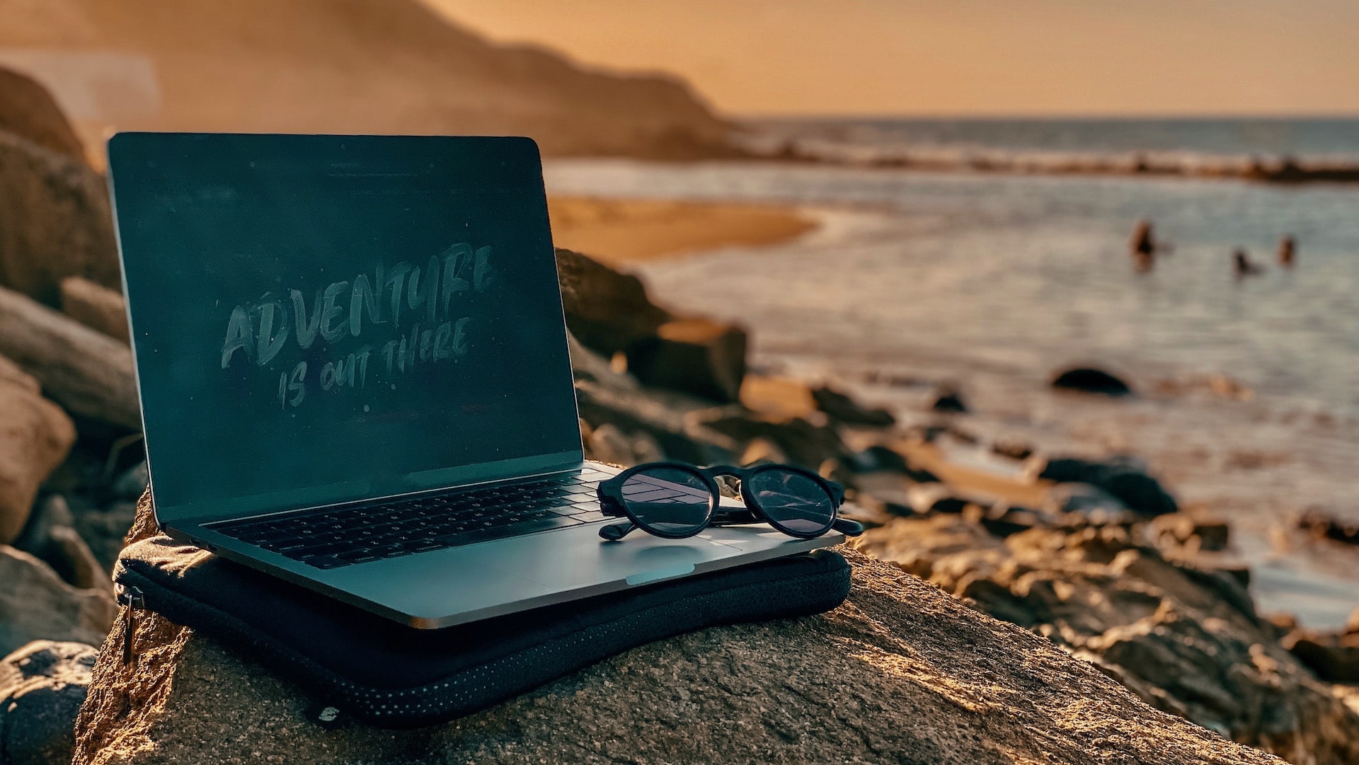 remote work laptop overlooking beach