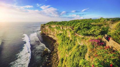 cliffs and waves crashing at uluwatu