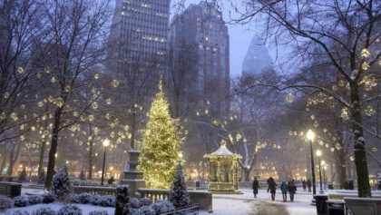 rittenhouse square at dusk with christmas tree and lights