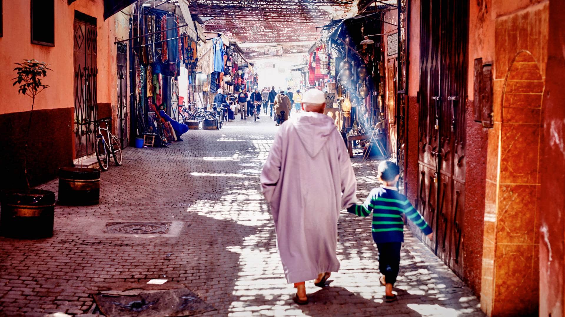 old man and child in marrakech medina