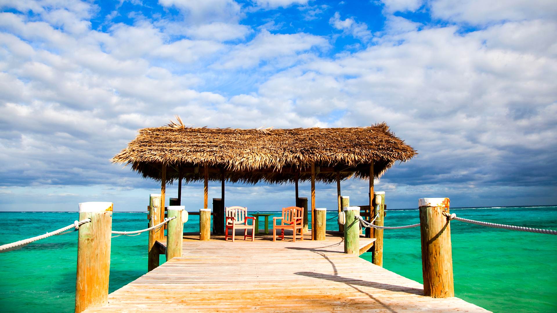 dock in the bahamas with chairs