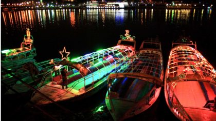 dhow boats with holiday lights