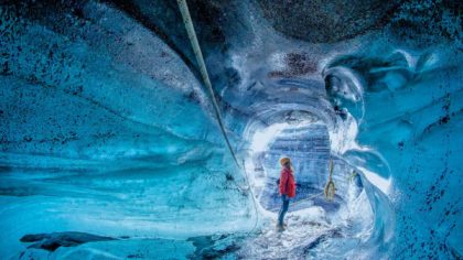 hiker in ice cave