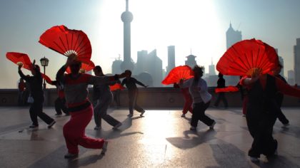people doing fan dance in shanghai
