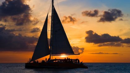 catamaran at sunset in aruba