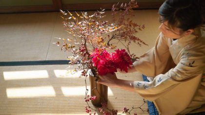 japanese woman arranging flowers