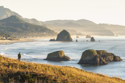 Man looking at view at Cannon Beach