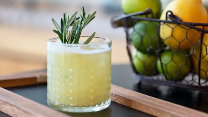 Margarita in glass with rosemary