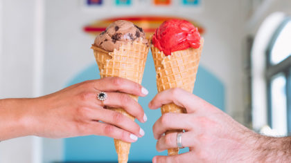 Two people eating ice cream cones