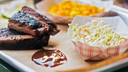 Barbecue ribs and coleslaw on a platter