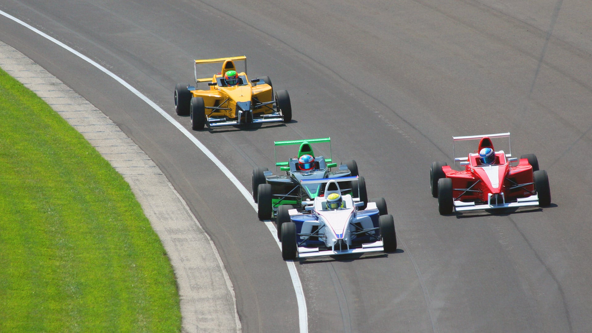 Race cars on Indianapolis Motor Speedway