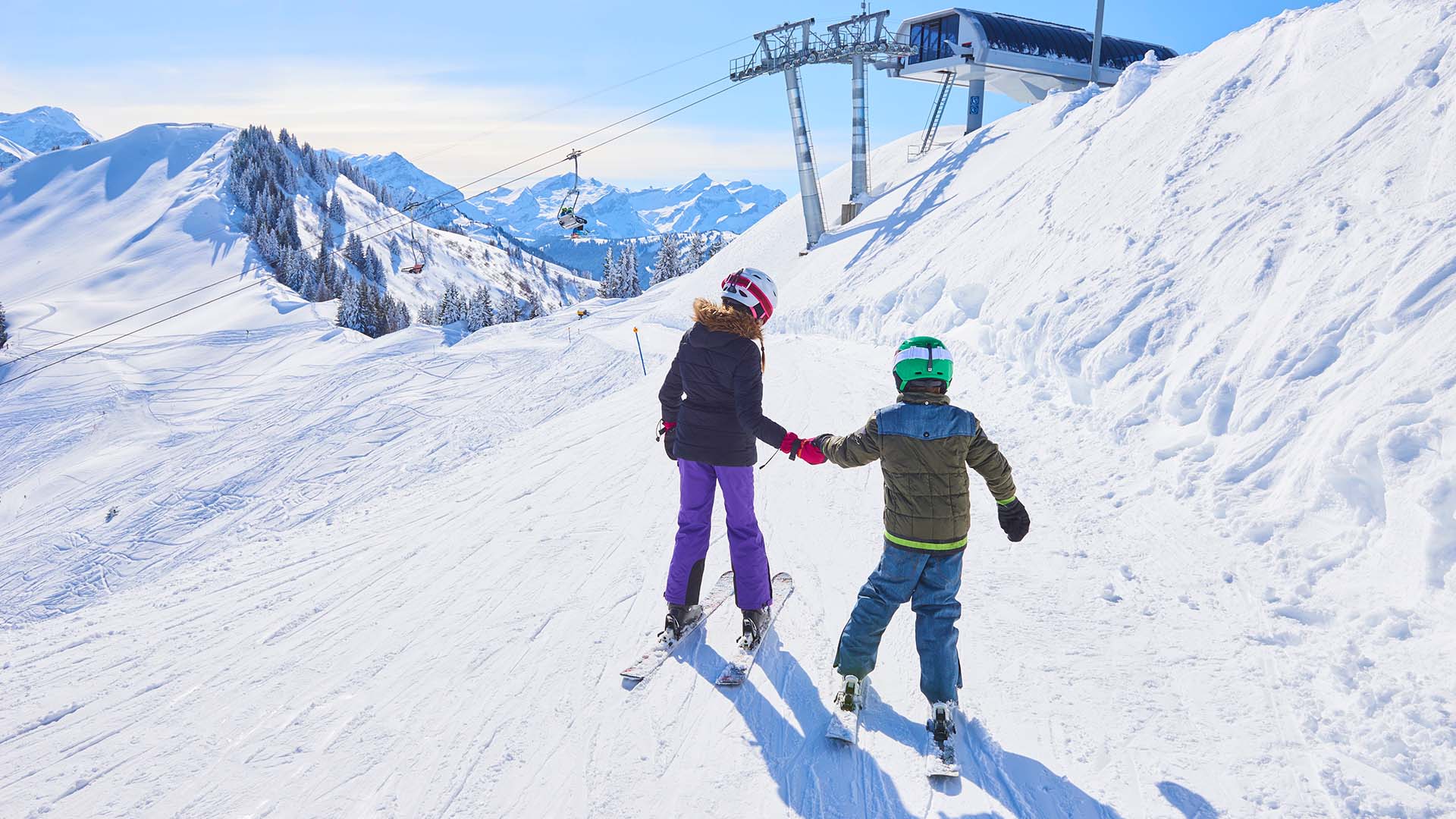 kids skiing in swiss alps
