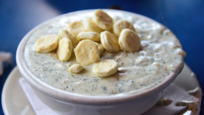 Bowl of clam chowder with oyster crackers