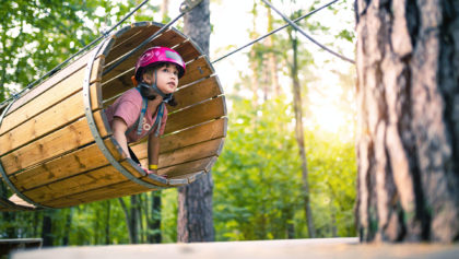 Child doing ropes course