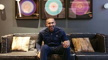 grant hill sitting on couch