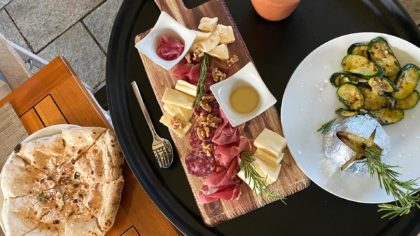 Charcuterie board with bread meat and cheese