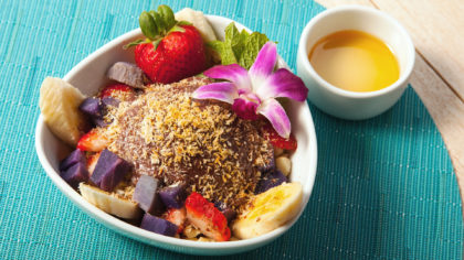 Acai bowl with flower and honey