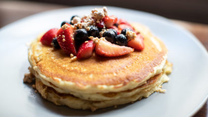 Pancakes with strawberries and blueberries