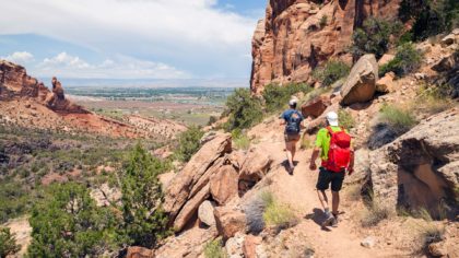 Colorado national monument sandstone hikers