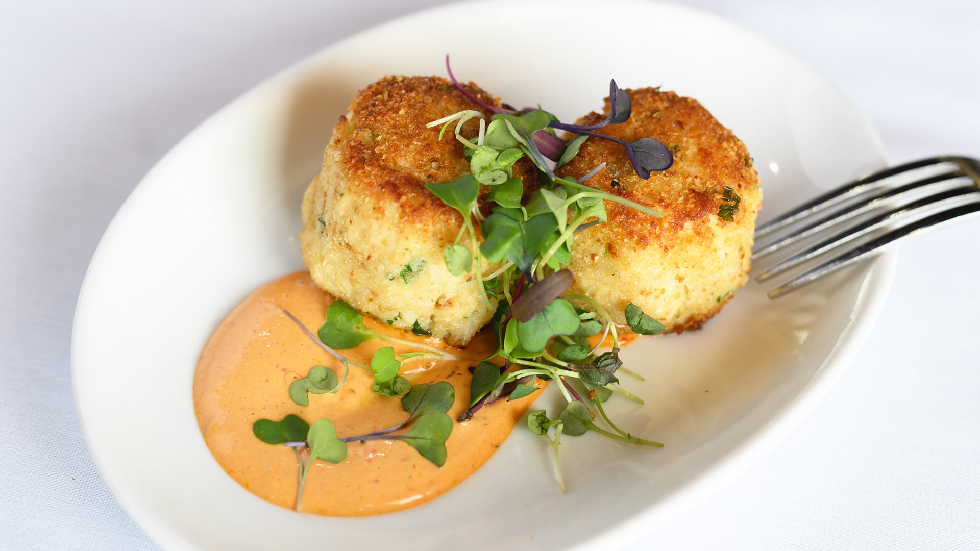 Crab cakes with micro greens