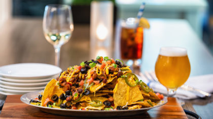 Loaded nachos and beer