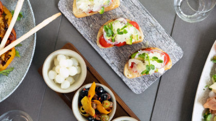 Spanish tapas with trio of bread and tomatoes