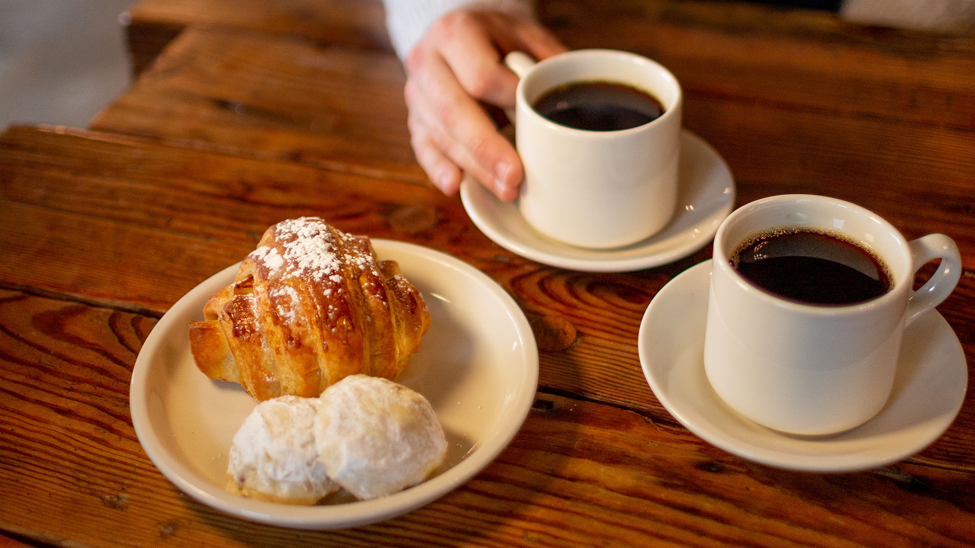 Coffee and croissants from Prosperity Kitchen and Pantry.