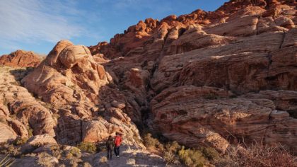 couple hiking in red rock canyon