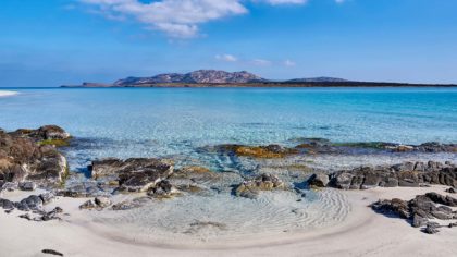 beach and tide pools in sardinia