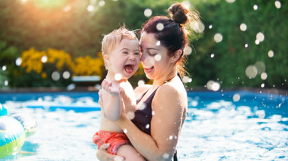 mom and son in pool