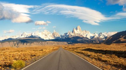 road with mountains in distance in argentina