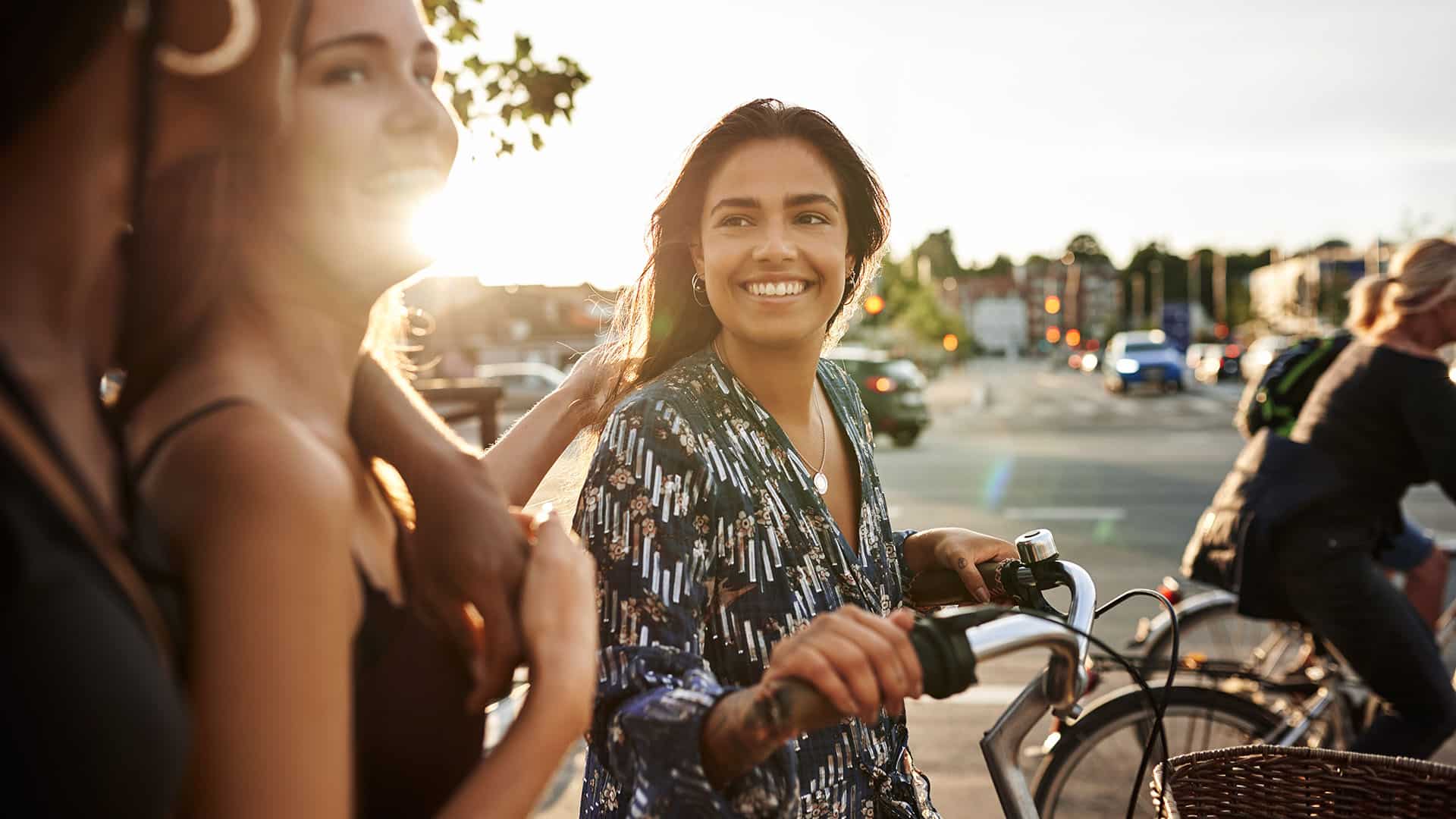 female friends with bicycle