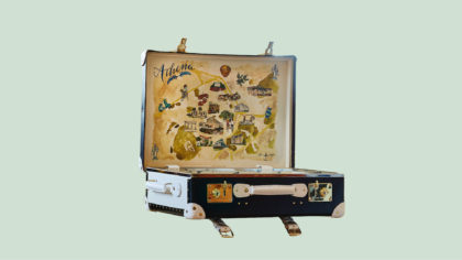 A suitcase with a map lining