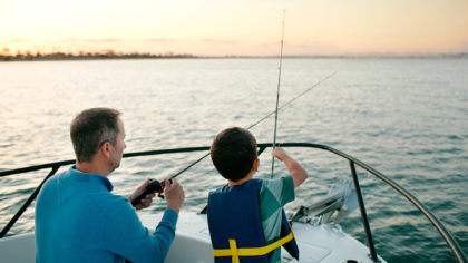 a dad and son fishing