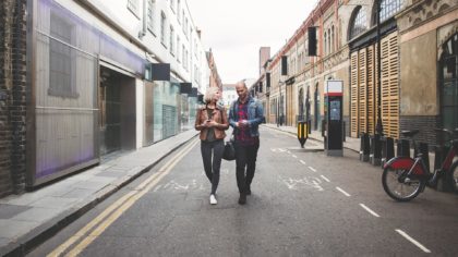 a couple walking down London streets