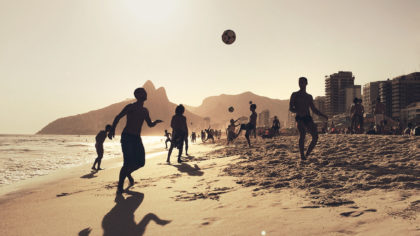 A group of people playing soccer