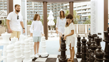 A family playing chess