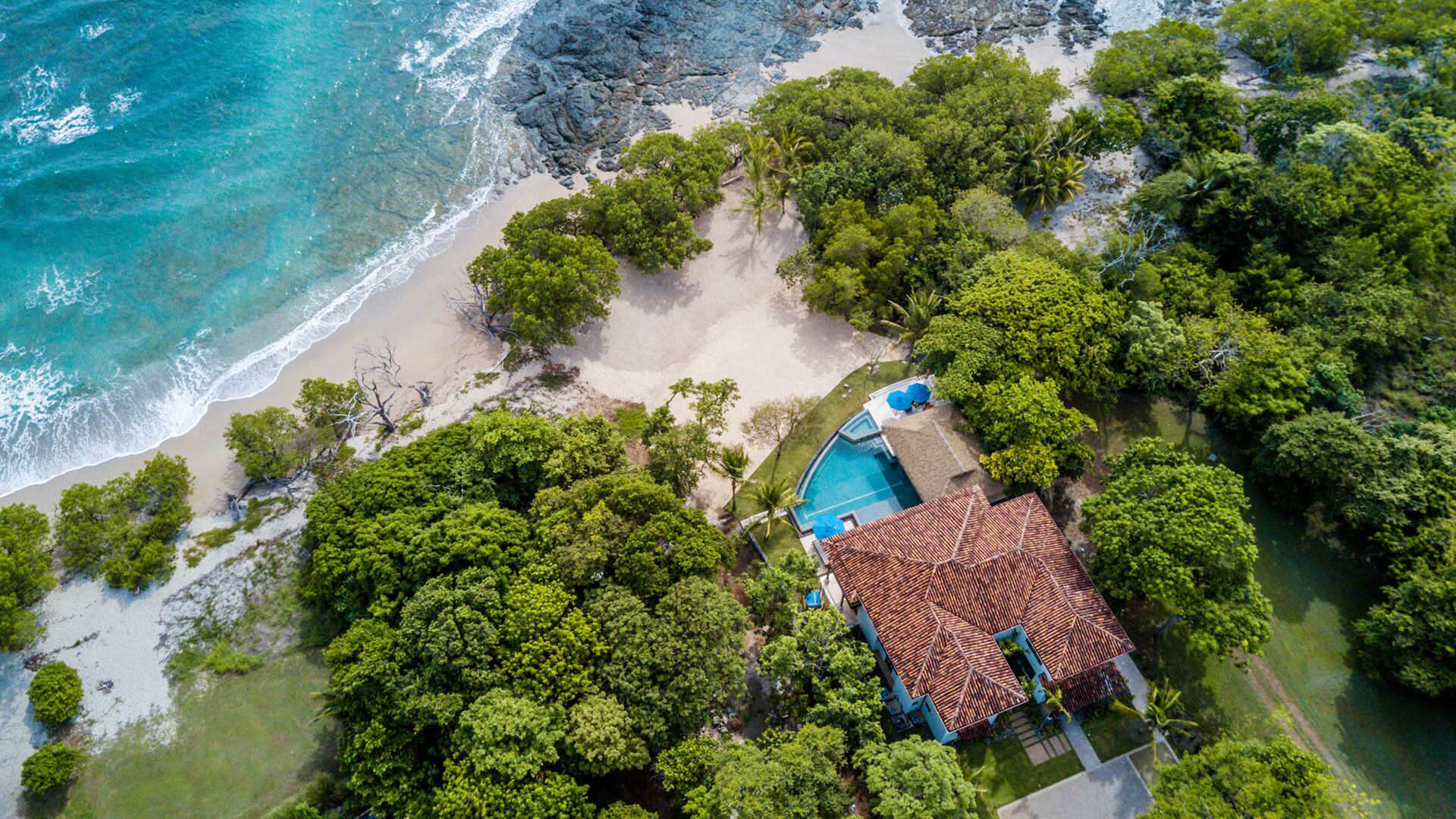 aerial view of beachfront vacation home in playa langosta