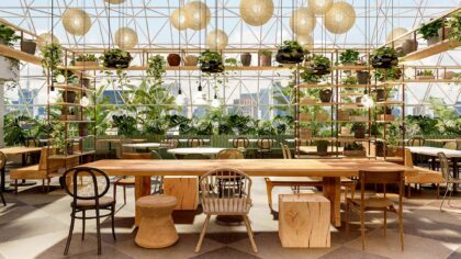 plants surround wood tables at Terraço Jardins Renaissance Sao Paulo Hotel