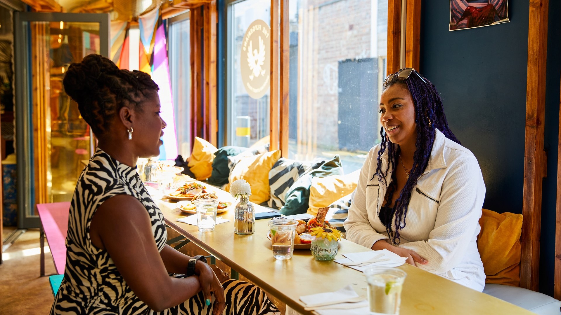 Oneika Raymond and Jendella Benson at The Flygerians Nigerian restaurant in London