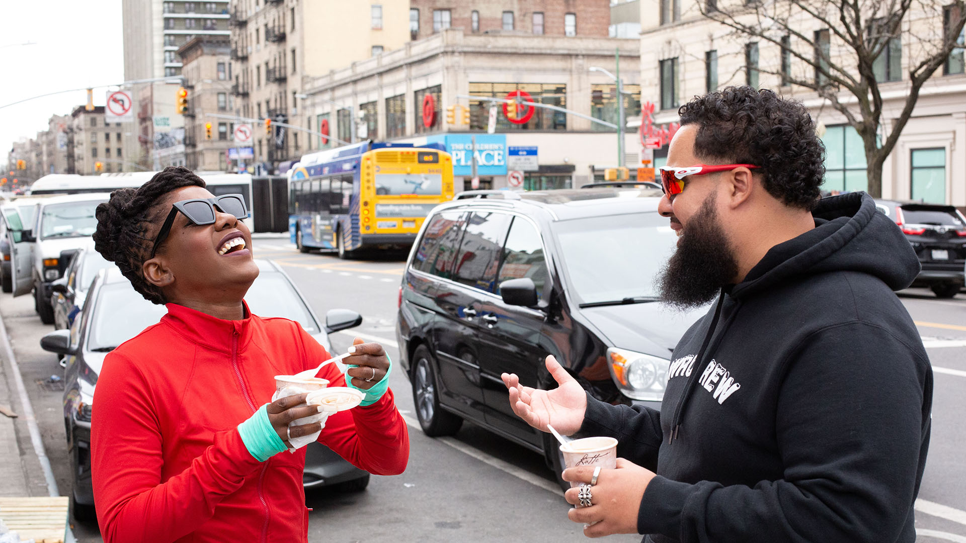 About the Journey host Oneika Raymond and We Run Uptown founder Hector Espinal talk and eat habichuelas con dulce on a Washington Heights street