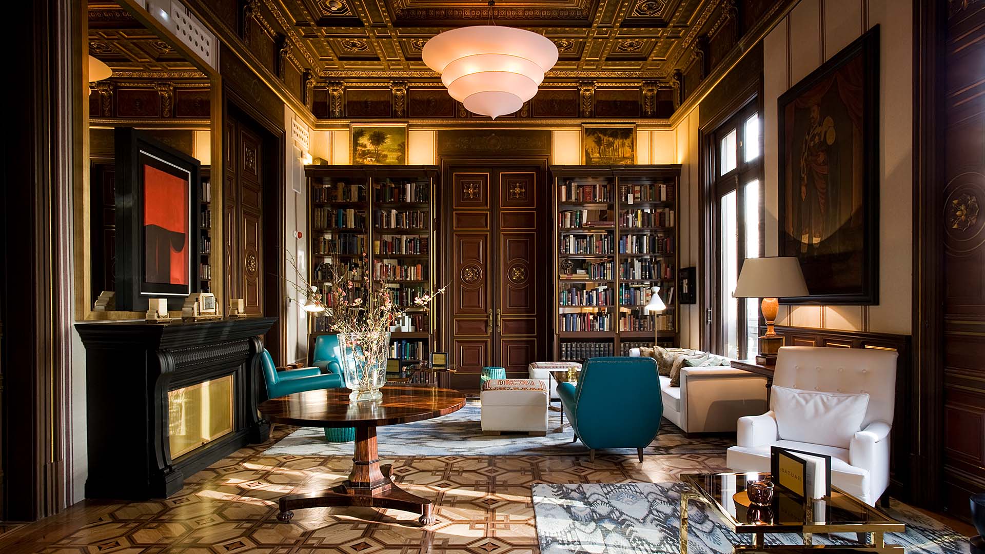 wooden and gold library at Cotton House Hotel, Autograph Collcetion in Barcelona