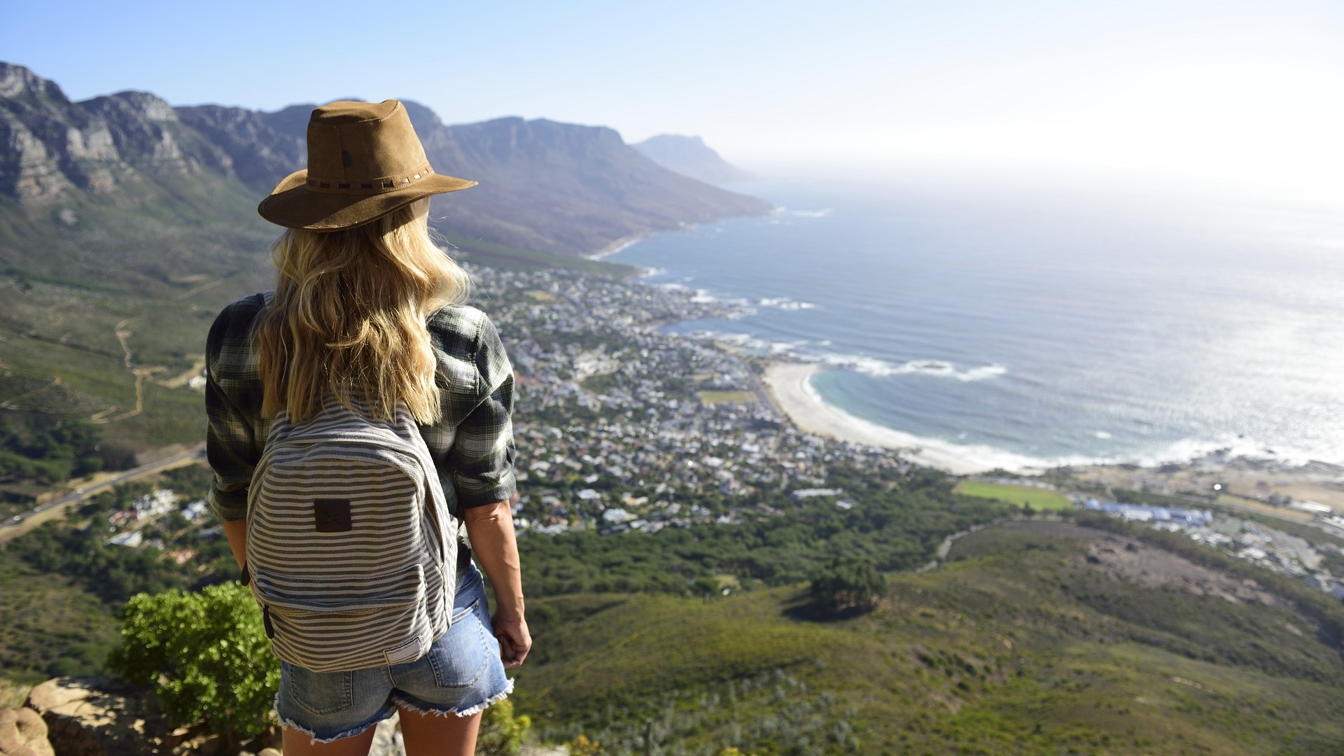 woman looking over Cape Town, Table Mountain and the Indian Ocean