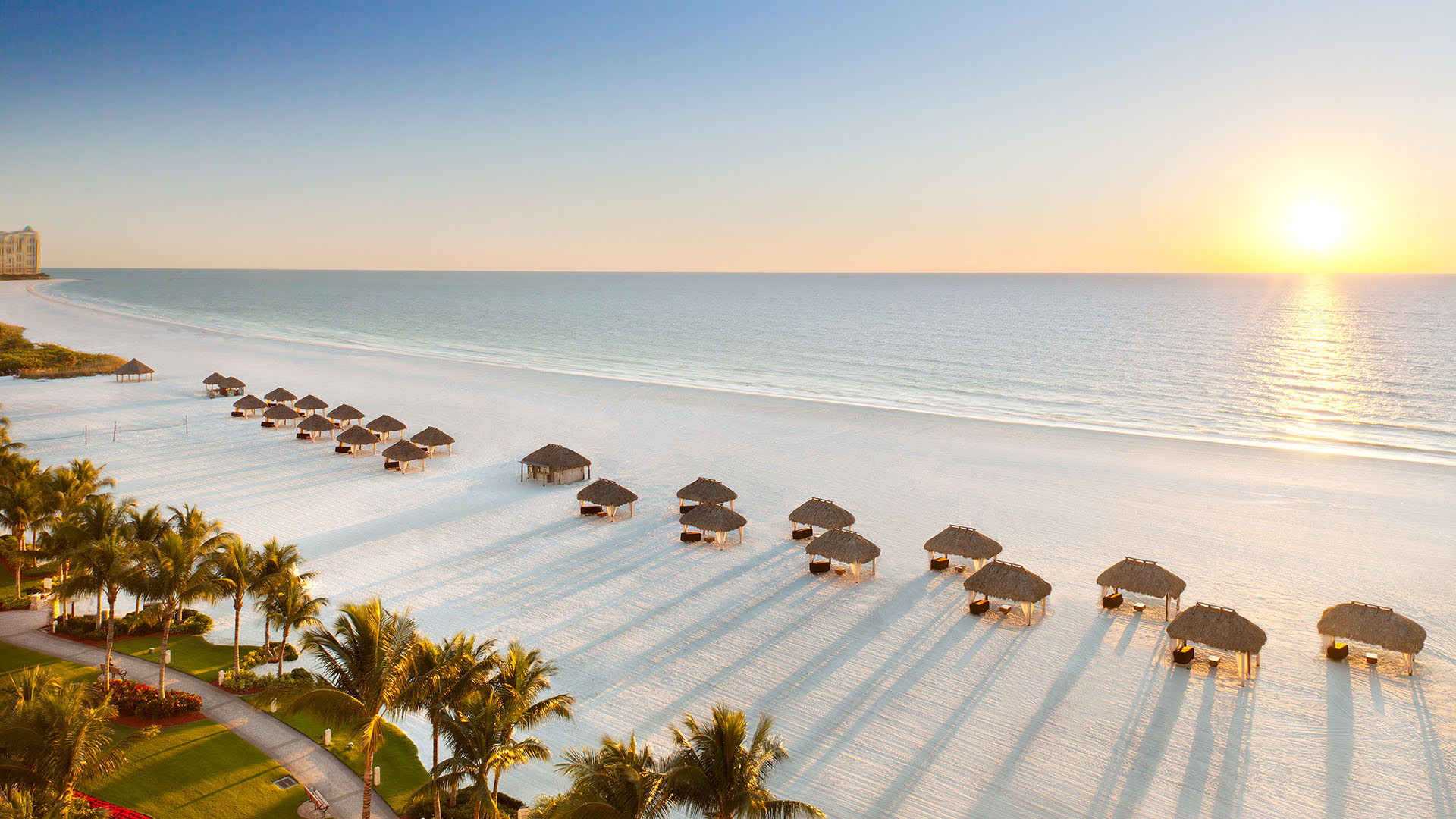 Beach cabanas at sunset at the JW Marriott Marco Island
