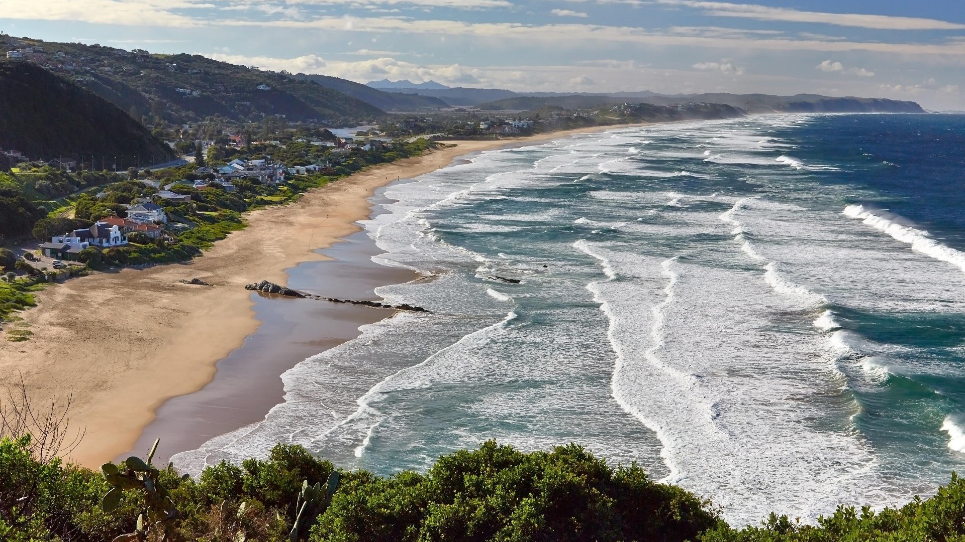 aerial view of ocean waves and coastline at Wilderness, South African beaches