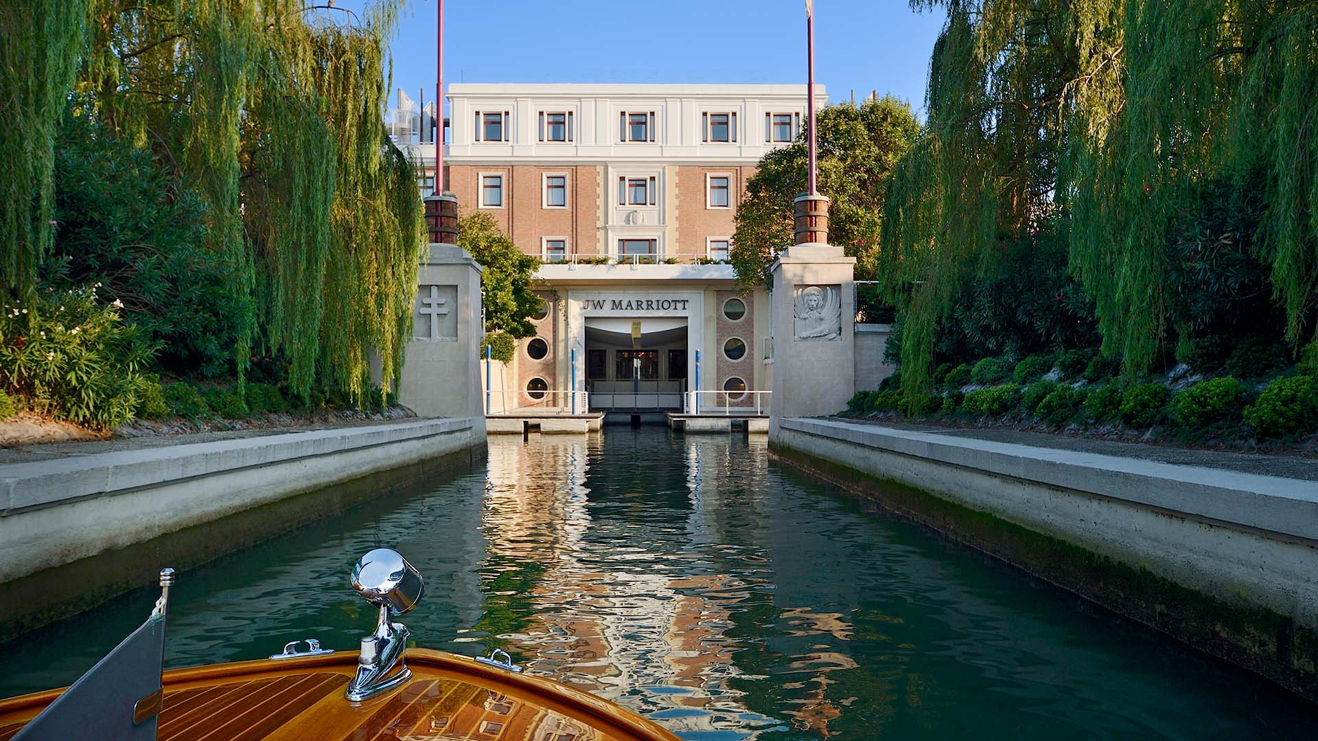 view of the JW Marriott Venice Resort & Spa waterway entrance, as seen from a boat