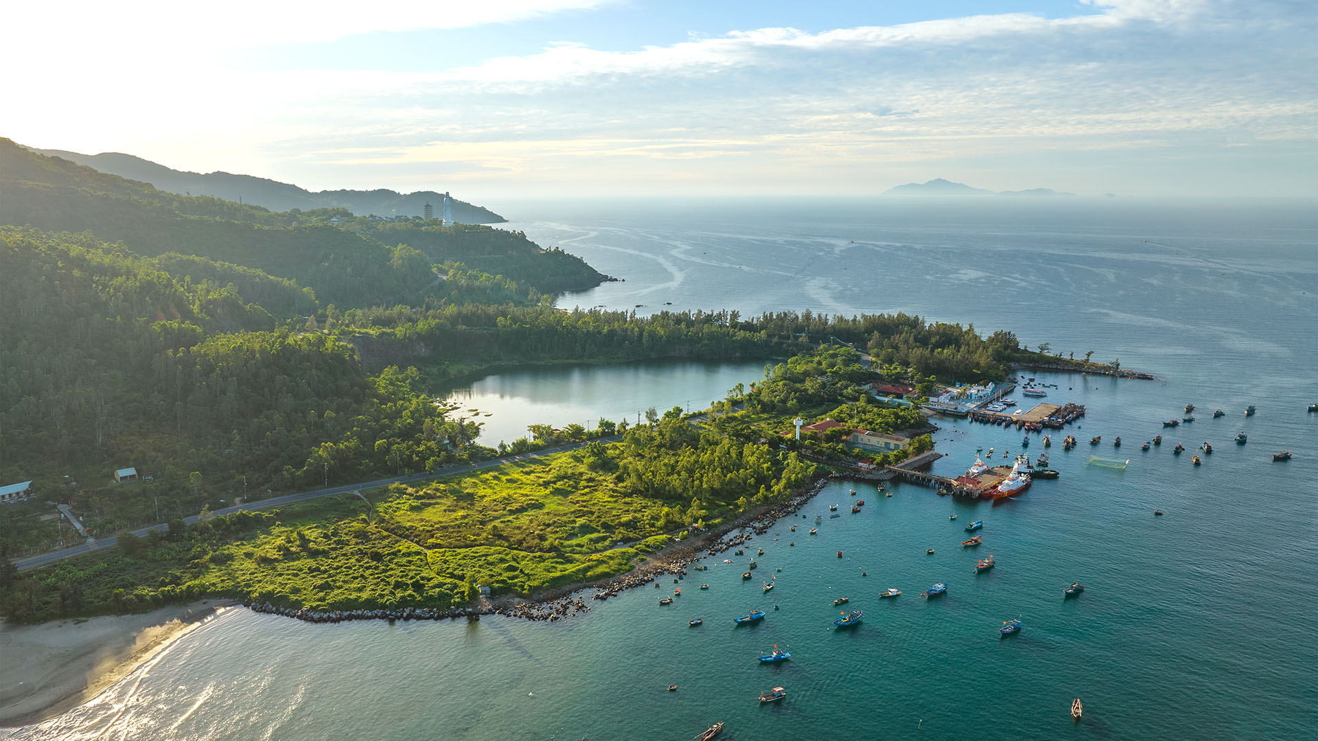 Aerial view of Son Tra Peninsula with boats and water in Da Nang Vietnam