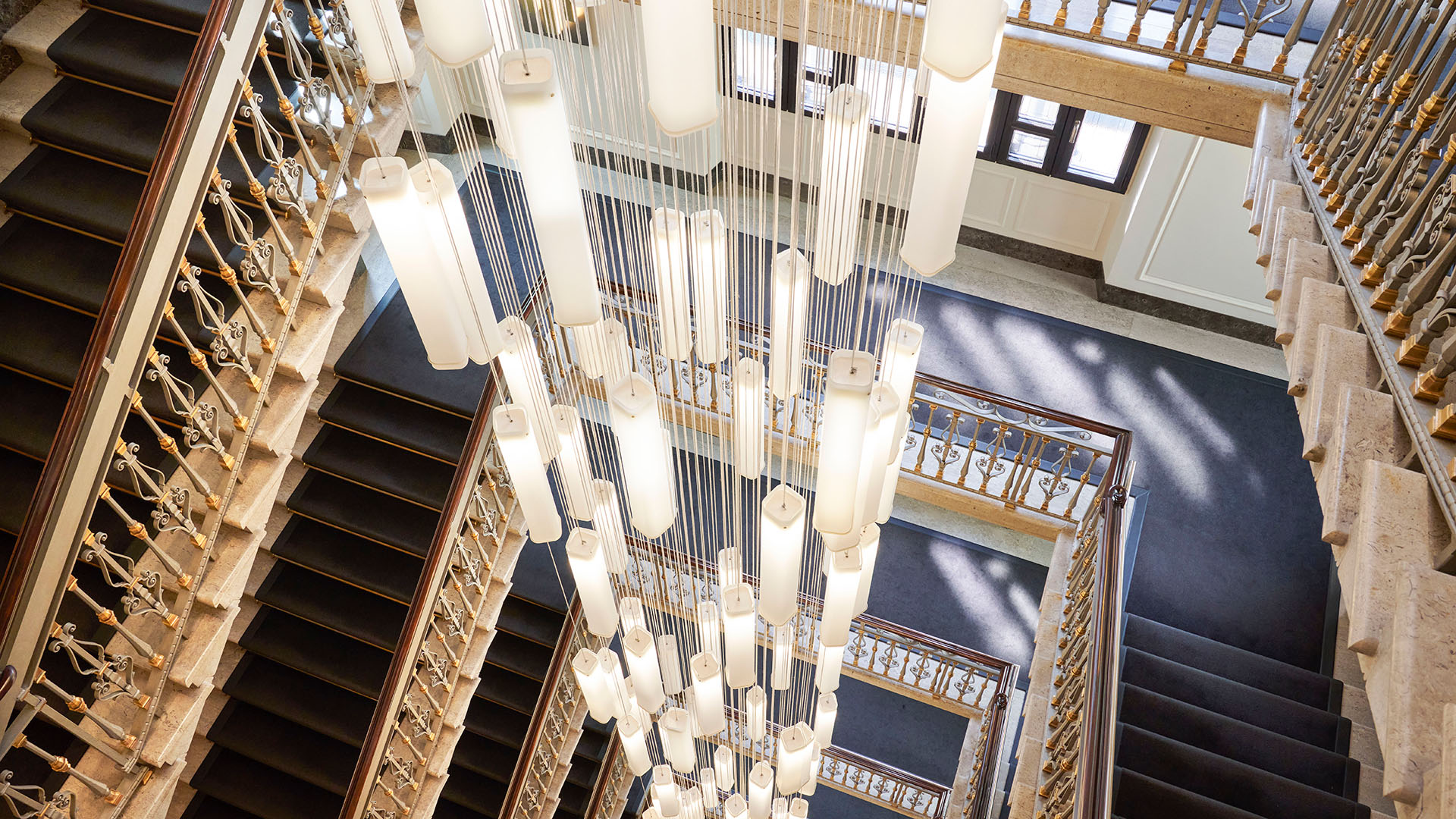 a view of an intricate light fixture at Excelsior Hotel Gallia, a Luxury Collection Hotel, Milan